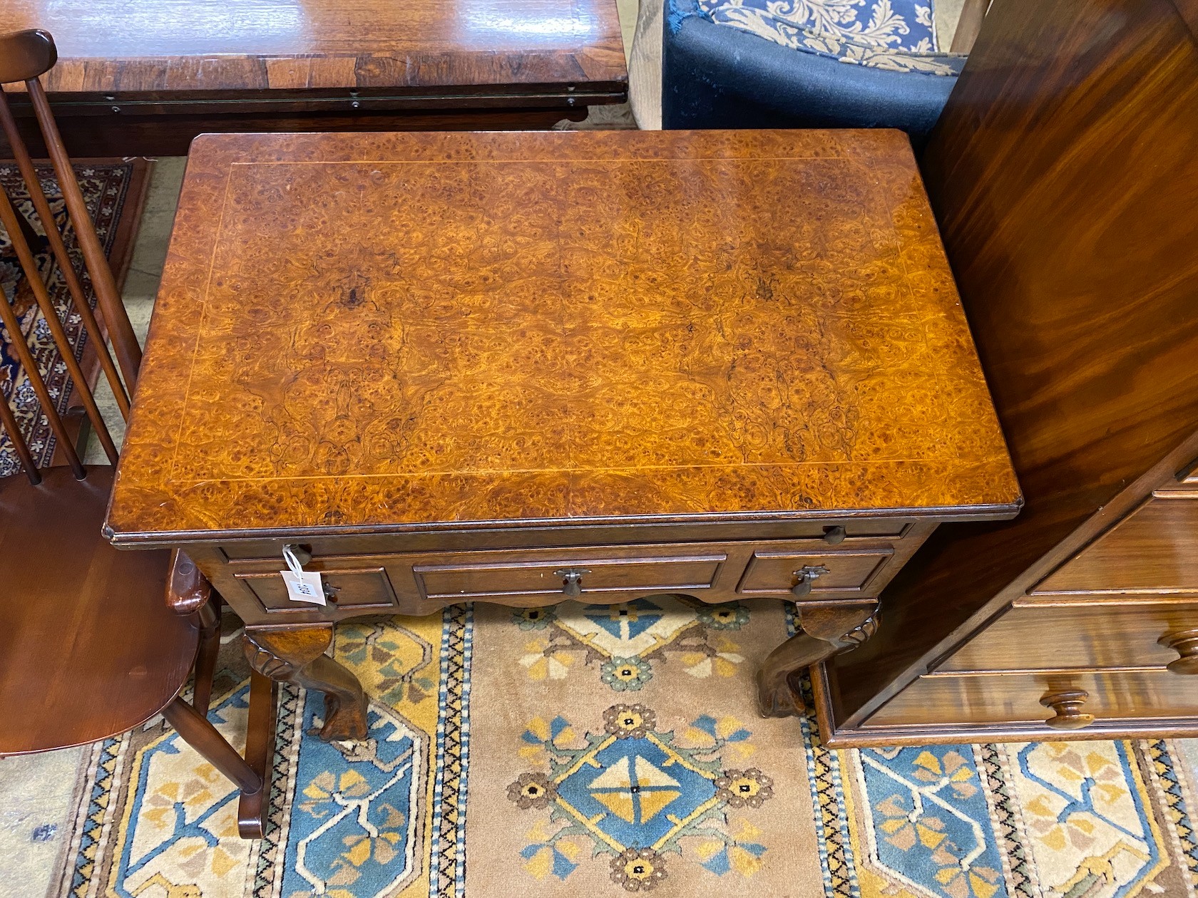 A reproduction George I style walnut and bird's eye maple lowboy, width 74cm, depth 45cm, height 79cm